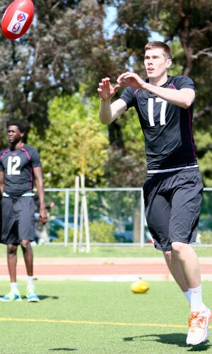 Mason Cox, the biggest athlete in the history of AFL testing, shines at international combine - ${keywords}